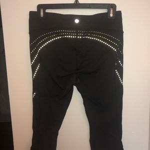 Black lululemon crops with reflexive dots on back